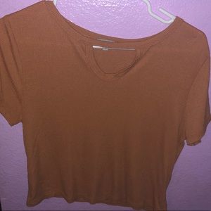 Orange cropped top w/ a cut in front